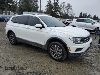 2020 Volkswagen Tiguan SE with VIN 3VV2B7AX0LM066834, listed as a Copart auction lot 50202205 with 66,530 mi miles and Salvage Title. Bid and sale history available at DreamBid. Image 4.