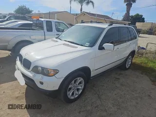2006 BMW X5 4.4i with VIN 5UXFB53556LV26283, listed as a Copart auction lot 79714584 with 77,033 mi miles and Clean Title. Bid and sale history available at carsss.com. Image 2.
