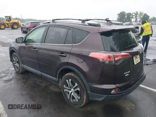 2018 Toyota RAV4 LE with VIN 2T3BFREV9JW857284, listed as a IAAI auction lot 42448480 with 85,551 mi miles and . Bid and sale history available at DreamBid. Image 3.
