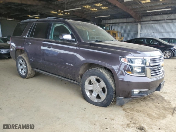 2016 Chevrolet Tahoe LTZ with VIN 1GNSKCKC2GR277192, listed as a Copart auction lot 49552145 with 131,659 mi miles and Salvage Title. Bid and sale history available at carsss.com. Image 4.