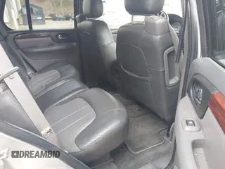 2004 GMC Envoy SLE with VIN 1GKDS13S442350938, listed as a IAAI auction lot 41790810 with 161,998 mi miles. Bid and sale history available at carsss.com. Image 8.