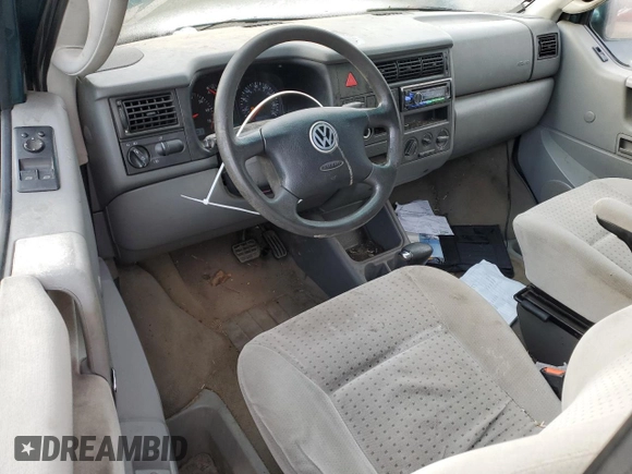 2002 Volkswagen EuroVan MV с VIN WV2NB47092H095600, выставлен на аукционе Copart как лот 50705065 с пробегом 223 049 миль миль и Чистый • Clean title. История ставок и продаж доступна на DreamBid. Изображение 8.