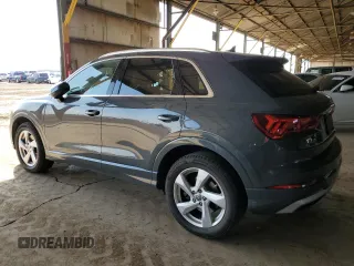 2020 Audi Q3 Premium with VIN WA1AECF34L1034797, listed as a Copart auction lot 51096385 with 74,192 mi miles and Salvage title. Bid and sale history available at DreamBid. Image 2.