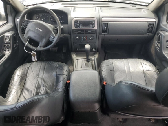 2004 Jeep Grand Cherokee Laredo z VIN 1J4GX48N94C386031, wystawiony jako Copart lot #55804755 z przebiegiem 160 103 mil mil oraz Szkoda całkowita • Salvage title. Historia ofert i sprzedaży dostępna na DreamBid. Obrazek 8.