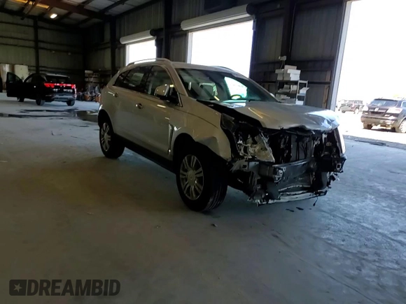 2014 Cadillac SRX Luxury Collection with VIN 3GYFNBE30ES596974, listed as a Copart auction lot 53278375 with 61,452 mi miles and Salvage Title. Bid and sale history available at DreamBid. Image 17.