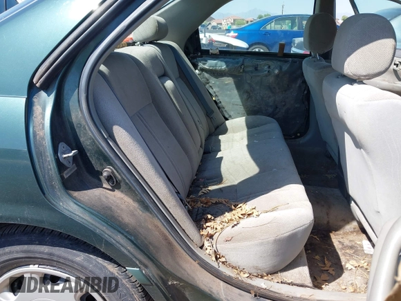 2000 Toyota Camry CE z VIN 4T1BG22K9YU931157, wystawiony jako IAAI lot #42370152 z przebiegiem 222 721 mil mil oraz . Historia ofert i sprzedaży dostępna na DreamBid. Obrazek 8.