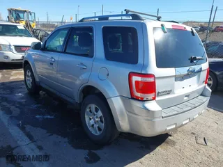 2010 Ford Escape Limited with VIN 1FMCU9EG8AKB12610, listed as a IAAI auction lot 41834872 with 214,218 mi miles. Bid and sale history available at carsss.com. Image 3.