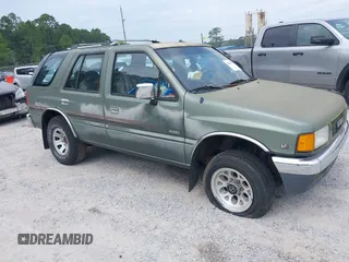 1992 Isuzu Rodeo z VIN 4S2CY58Z5N4318786, wystawiony jako IAAI lot #42859574 z przebiegiem 149 466 mil mil oraz . Historia ofert i sprzedaży dostępna na DreamBid. Obrazek 1.