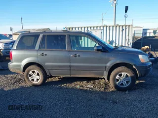 2003 Honda Pilot EX with VIN 2HKYF18433H614451, listed as a IAAI auction lot 41561972 with 199,394 mi miles. Bid and sale history available at carsss.com. Image 14.