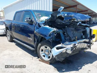 2021 Ram 1500 Big Horn with VIN 1C6SRFFT5MN776532, listed as a IAAI auction lot 42532401 with 64,779 mi miles and . Bid and sale history available at DreamBid. Image 1.