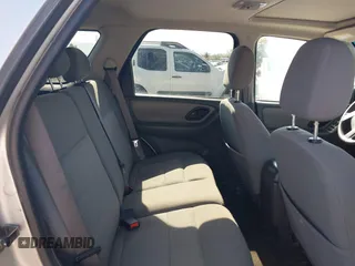 2006 Ford Escape XLT z VIN 1FMCU93136KC15231, wystawiony jako IAAI lot #42625410 z przebiegiem 117 479 mil mil oraz . Historia ofert i sprzedaży dostępna na DreamBid. Obrazek 8.