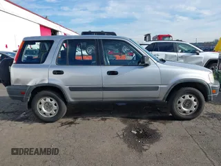 2000 Honda CR-V LX with VIN JHLRD184XYC054038, listed as a IAAI auction lot 41414445 with 294,210 mi miles. Bid and sale history available at carsss.com. Image 13.