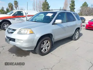 2005 Acura MDX Touring with VIN 2HNYD18935H500957, listed as a IAAI auction lot 41784083 with 250,245 mi miles. Bid and sale history available at carsss.com. Image 2.