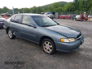 1999 Nissan Altima XE z VIN 1N4DL01DXXC149086, wystawiony jako IAAI lot #42528609 z przebiegiem 217 698 mil mil oraz . Historia ofert i sprzedaży dostępna na DreamBid. Obrazek 1.