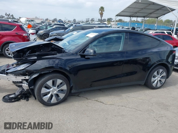2023 Tesla Model Y Long Range z VIN 7SAYGDEE2PF863200, wystawiony jako IAAI lot #41805168 z przebiegiem 25 480 mil mil oraz . Historia ofert i sprzedaży dostępna na DreamBid. Obrazek 15.