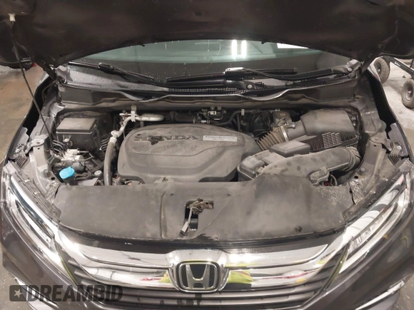 2018 Honda Odyssey Touring with VIN 5FNRL6H84JB041309, listed as a IAAI auction lot 42272247 with 90,371 mi miles and . Bid and sale history available at DreamBid. Image 10.