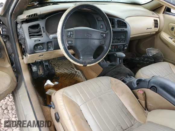2000 Chevrolet Monte Carlo SS z VIN 2G1WX12K9Y9218524, wystawiony jako Copart lot #88758735 z przebiegiem Nie podano mil oraz Szkoda całkowita • Salvage title. Historia ofert i sprzedaży dostępna na DreamBid. Obrazek 8.