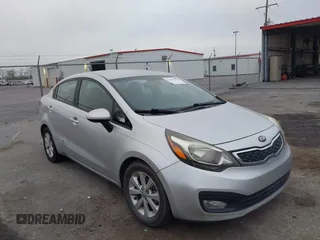 2013 Kia Rio SX with VIN KNADN4A3XD6168179, listed as a IAAI auction lot 41909704 with 79,653 mi miles. Bid and sale history available at carsss.com. Image 1.