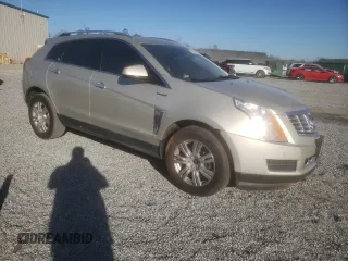 2014 Cadillac SRX Luxury Collection z VIN 3GYFNBE38ES516403, wystawiony jako Copart lot #49645375 z przebiegiem 143 769 mil mil oraz Szkody całkowita. Historia ofert i sprzedaży dostępna na DreamBid. Obrazek 4.