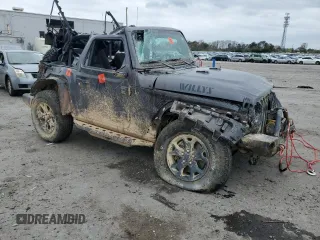 2020 Jeep Wrangler Sport S with VIN 1C4GJXAG4LW247149, listed as a Copart auction lot 51600935 with 49,648 mi miles and Salvage title. Bid and sale history available at DreamBid. Image 4.