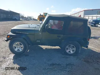 2006 Jeep Wrangler Rubicon z VIN 1J4FA69SX6P788424, wystawiony jako IAAI lot #41712349 z przebiegiem 121 684 mil mil oraz . Historia ofert i sprzedaży dostępna na DreamBid. Obrazek 15.