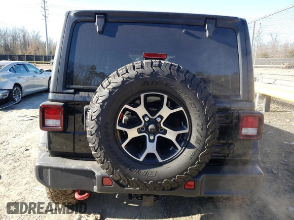 2021 Jeep Wrangler Unlimited Rubicon with VIN 1C4HJXFGXMW580776, listed as a Copart auction lot 46478105 with 56,120 mi miles and Salvage Title. Bid and sale history available at DreamBid. Image 6.