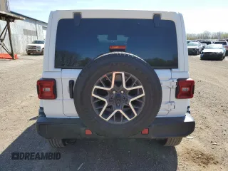 2024 Jeep Wrangler Sahara with VIN 1C4PJXEN7RW297948, listed as a Copart auction lot 54656795 with 12,292 mi miles and Salvage title. Bid and sale history available at DreamBid. Image 6.