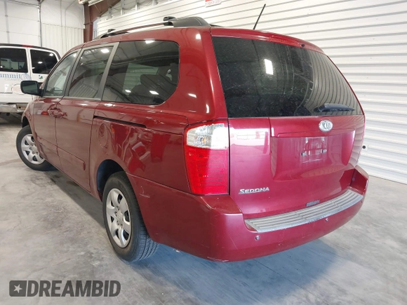 2010 Kia Sedona LX with VIN KNDMG4C35A6343380, listed as a IAAI auction lot 42042669 with 119,648 mi miles. Bid and sale history available at carsss.com. Image 3.