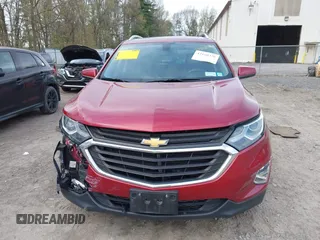 2018 Chevrolet Equinox LT z VIN 2GNAXSEV4J6295443, wystawiony jako IAAI lot #42160326 z przebiegiem 83 562 mil mil oraz . Historia ofert i sprzedaży dostępna na DreamBid. Obrazek 12.