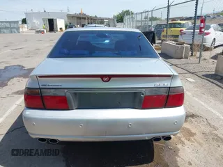 2003 Cadillac Seville Luxury SLS z VIN 1G6KS54Y43U214795, wystawiony jako IAAI lot #42348542 z przebiegiem 144 438 mil mil oraz . Historia ofert i sprzedaży dostępna na DreamBid. Obrazek 16.