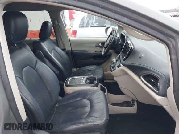 2021 Chrysler Pacifica Touring L with VIN 2C4RC1BG0MR543634, listed as a IAAI auction lot 41513467 with 148,010 mi miles and . Bid and sale history available at DreamBid. Image 5.