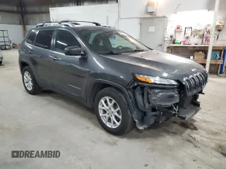 2015 Jeep Cherokee Latitude with VIN 1C4PJMCS0FW787988, listed as a Copart auction lot 52105155 with 117,254 mi miles and Salvage Title. Bid and sale history available at DreamBid. Image 4.