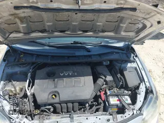 2010 Toyota Corolla with VIN 2T1BU4EE3AC516238, listed as a IAAI auction lot 42013212 with 103,257 mi miles. Bid and sale history available at carsss.com. Image 10.