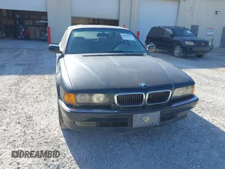 1998 BMW 7 Series 740il with VIN WBAGJ8323WDM13455, listed as a IAAI auction lot 41888636 with 1 mi miles. Bid and sale history available at carsss.com. Image 6.