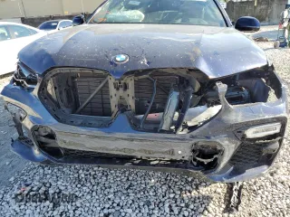 2021 BMW X6 M50i with VIN 5UXCY8C09M9E66884, listed as a Copart auction lot 63025622 with 26,220 mi miles and Salvage Title. Bid and sale history available at carsss.com. Image 9.