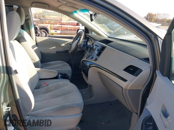 2012 Toyota Sienna LE with VIN 5TDJK3DCXCS039801, listed as a IAAI auction lot 41483248 with 165,548 mi miles. Bid and sale history available at carsss.com. Image 5.