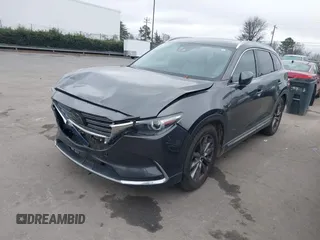 2016 Mazda CX-9 Grand Touring with VIN JM3TCADY4G0111310, listed as a IAAI auction lot 41532851 with 178,907 mi miles and . Bid and sale history available at DreamBid. Image 17.