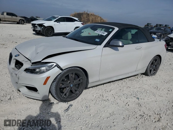 2016 BMW 2 Series M235i with VIN WBA1M1C52GV394052, listed as a Copart auction lot 82261594 with 83,979 mi miles and Salvage Title. Bid and sale history available at carsss.com. Image 1.