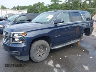 2018 Chevrolet Tahoe LT with VIN 1GNSKBKC7JR256937, listed as a IAAI auction lot 42614438 with 92,794 mi miles and . Bid and sale history available at DreamBid. Image 17.