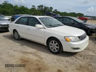 2001 Toyota Avalon XL z VIN 4T1BF28B91U155354, wystawiony jako Copart lot #52393885 z przebiegiem 277 545 mil mil oraz Szkody całkowita. Historia ofert i sprzedaży dostępna na DreamBid. Obrazek 4.