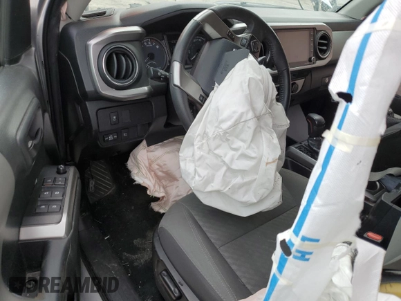 2023 Toyota Tacoma SR5 с VIN 3TMAZ5CN0PM201788, выставлен на аукционе Copart как лот 51878365 с пробегом 50 468 миль миль и На запчасти • Non repairable. История ставок и продаж доступна на DreamBid. Изображение 8.