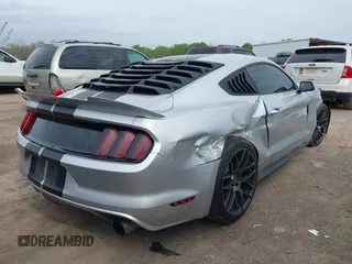 2015 Ford Mustang EcoBoost with VIN 1FA6P8TH9F5373917, listed as a IAAI auction lot 41932118 with 70,541 mi miles and . Bid and sale history available at carsss.com. Image 4.
