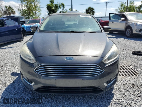 2015 Ford Focus Titanium with VIN 1FADP3N24FL260486, listed as a Copart auction lot 49856865 with Not provided miles and Clean title. Bid and sale history available at DreamBid. Image 5.