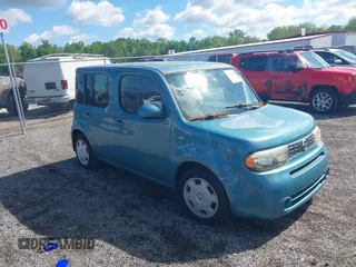 2010 Nissan Cube S z VIN JN8AZ2KRXAT160358, wystawiony jako IAAI lot #42200320 z przebiegiem 141 009 mil mil oraz . Historia ofert i sprzedaży dostępna na DreamBid. Obrazek 1.