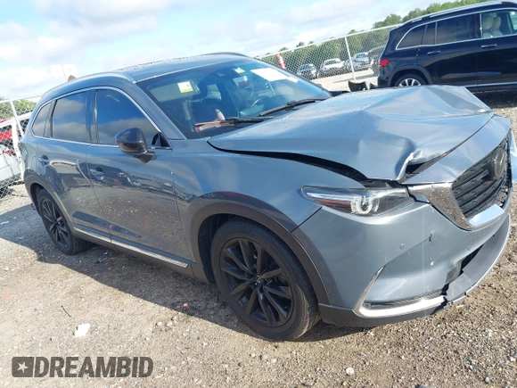 2021 Mazda CX-9 Grand Touring with VIN JM3TCADY7M0528223, listed as a IAAI auction lot 42395861 with 57,767 mi miles and . Bid and sale history available at DreamBid. Image 1.