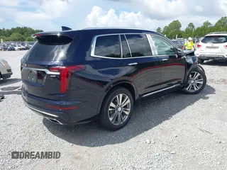 2022 Cadillac XT6 Premium Luxury with VIN 1GYKPCRS4NZ145145, listed as a IAAI auction lot 42533642 with 36,450 mi miles and . Bid and sale history available at DreamBid. Image 4.