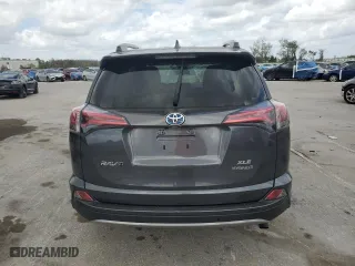 2018 Toyota RAV4 Hybrid LE Plus with VIN JTMRJREV9JD239456, listed as a Copart auction lot 47794485 with 128,136 mi miles and Salvage Title. Bid and sale history available at carsss.com. Image 6.