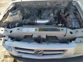 2003 Mazda B-Series Truck DS z VIN 4F4YR16U13TM01916, wystawiony jako Copart lot #53642875 z przebiegiem 86 309 mil mil oraz Szkoda całkowita • Salvage title. Historia ofert i sprzedaży dostępna na DreamBid. Obrazek 11.