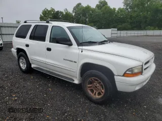 2001 Dodge Durango z VIN 1B4HS28Z21F570427, wystawiony jako Copart lot #58657475 z przebiegiem 114 295 mil mil oraz Tytuł czysty. Historia ofert i sprzedaży dostępna na DreamBid. Obrazek 4.