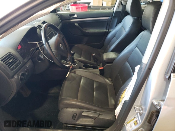 2009 Volkswagen Jetta z VIN 3VWAL71KX9M072304, wystawiony jako Copart lot #57027785 z przebiegiem 191 554 mil mil oraz Szkoda całkowita • Salvage title. Historia ofert i sprzedaży dostępna na DreamBid. Obrazek 7.